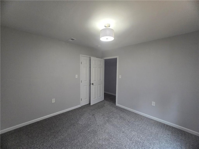 spare room with carpet floors