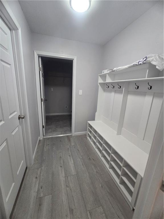 mudroom with wood-type flooring