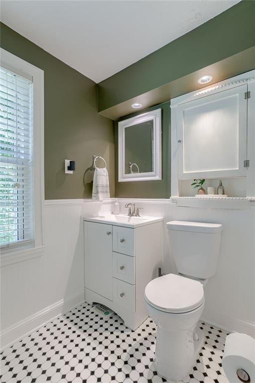 bathroom with vanity and toilet