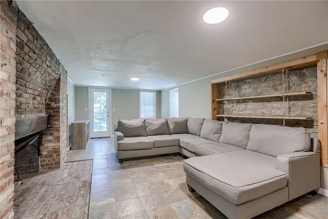 unfurnished living room featuring a fireplace