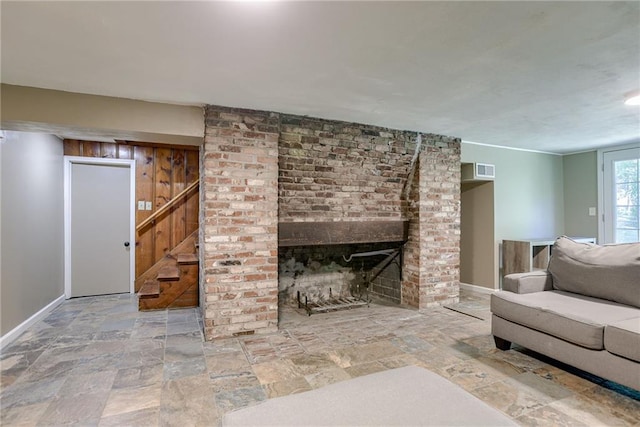 unfurnished living room with a fireplace