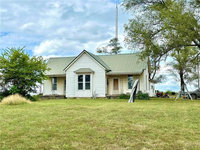 view of front of property with a front lawn