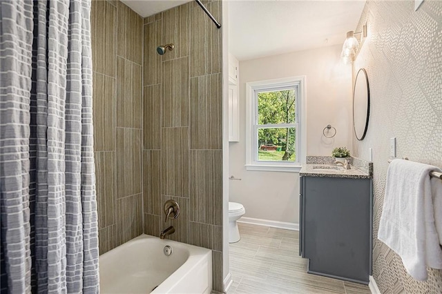 full bathroom featuring vanity, toilet, and shower / bath combo