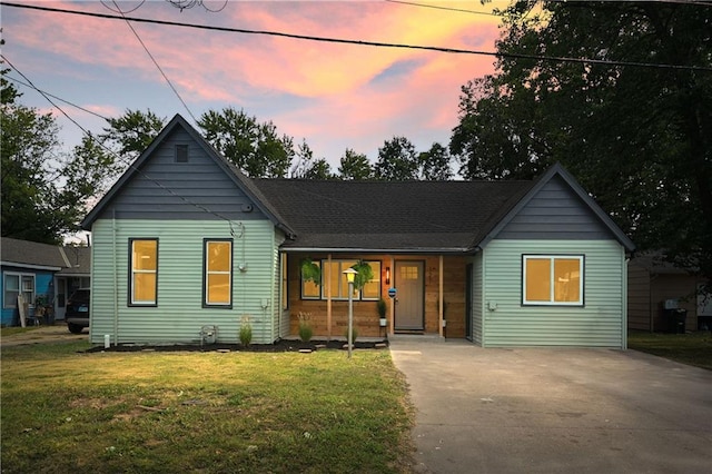 view of front of home with a yard