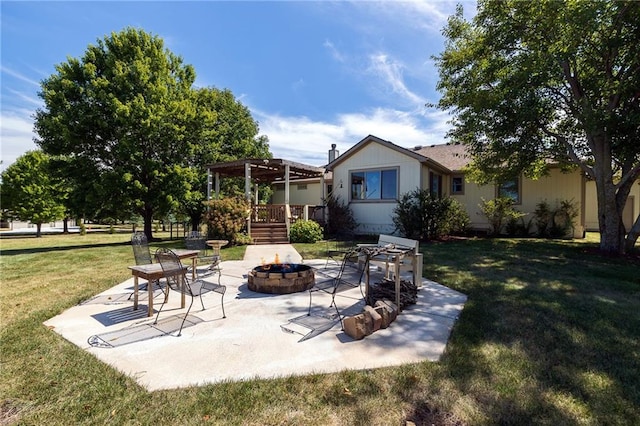 view of patio featuring a fire pit and a pergola