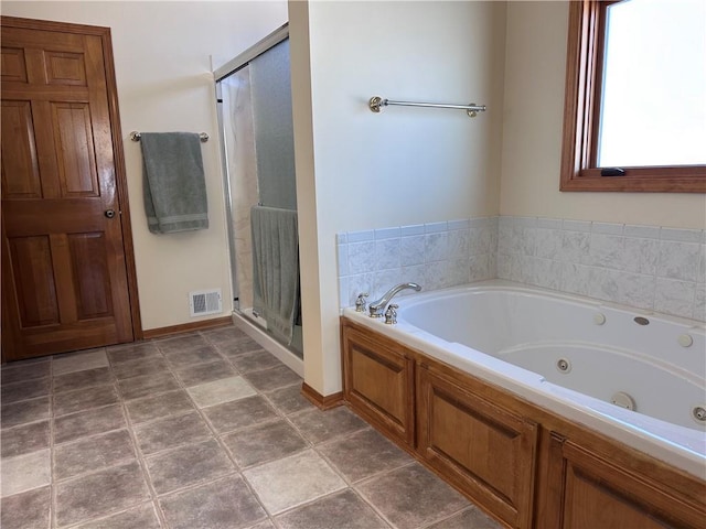 bathroom with plus walk in shower