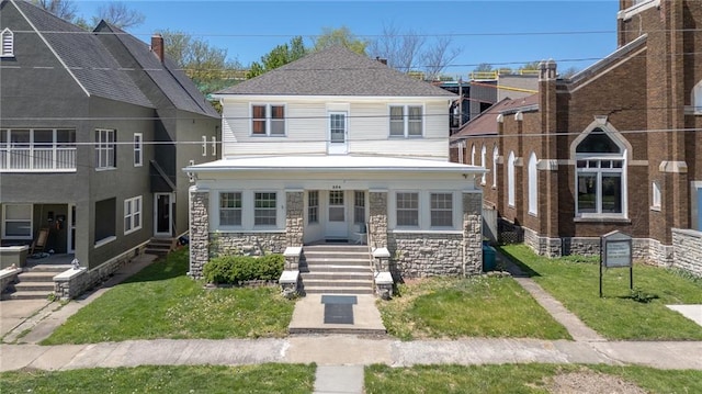 view of front of home featuring a front lawn