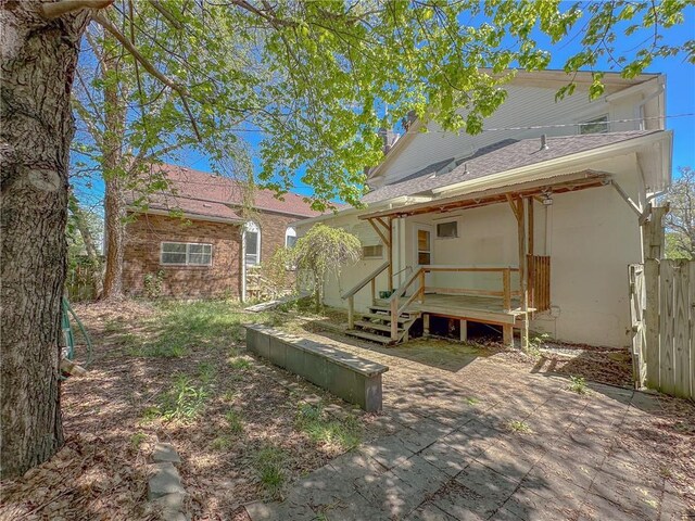 back of house with a patio area