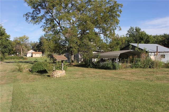 view of yard featuring a carport