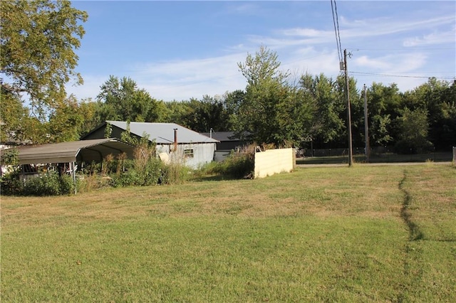 view of yard featuring a carport