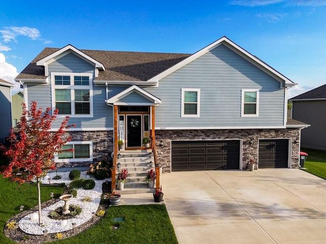 bi-level home featuring a garage