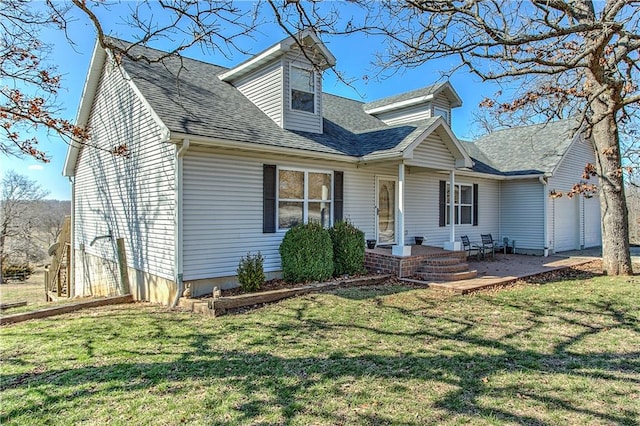 new england style home with a front yard