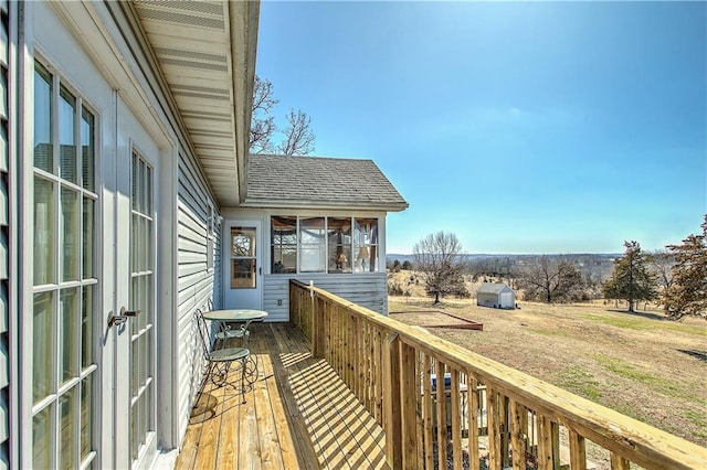 wooden balcony with a wooden deck