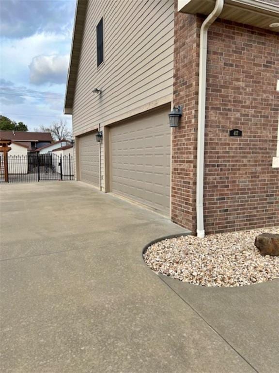 view of property exterior featuring a garage