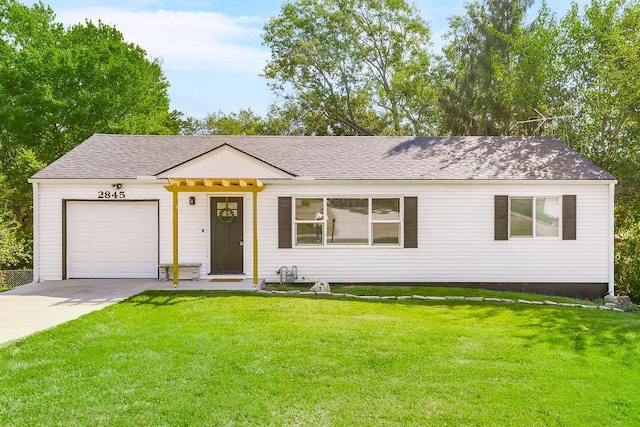 single story home featuring a front yard and a garage