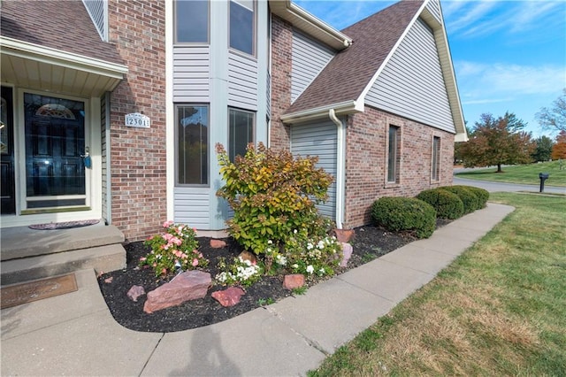 view of property exterior featuring a yard