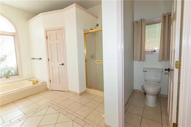 bathroom with toilet, tile patterned flooring, and plus walk in shower