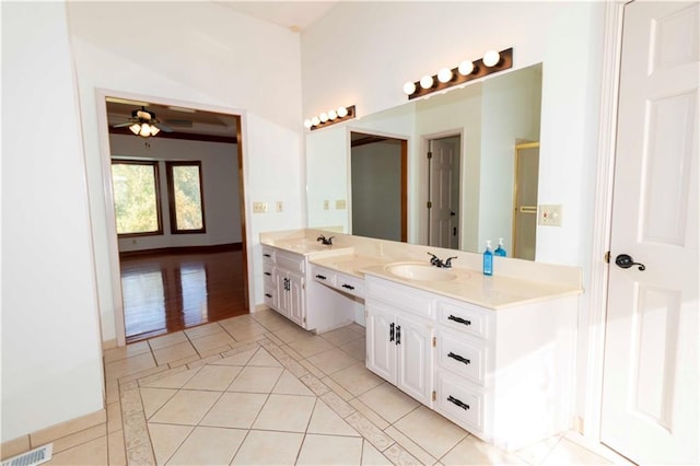 bathroom with vanity, tile patterned floors, and ceiling fan