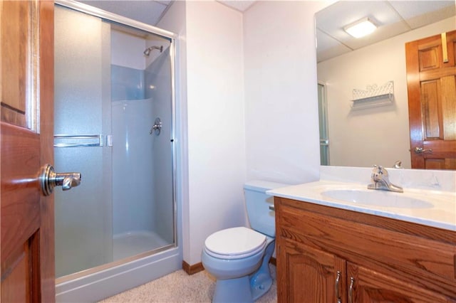 bathroom with vanity, toilet, and walk in shower