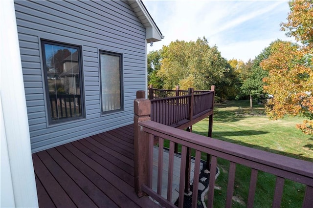 wooden terrace with a yard