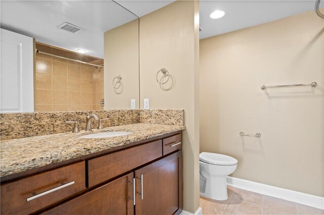 600 E Admiral Blvd Unit 704, Kansas City, MO 64106 - bathroom featuring vanity, a shower, recessed lighting, and tile patterned flooring