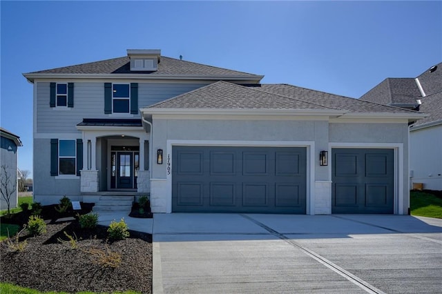 view of front of property featuring a garage