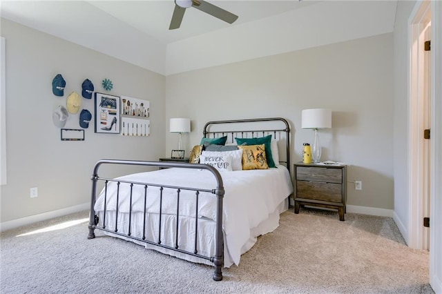 bedroom with ceiling fan and light carpet