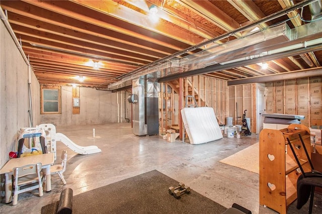 basement featuring heating unit