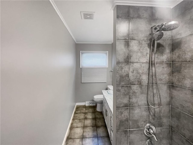 bathroom featuring baseboards, visible vents, a tile shower, crown molding, and toilet