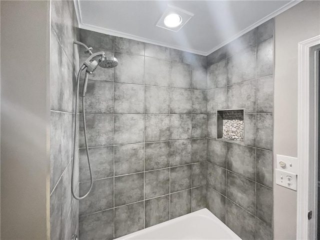 bathroom featuring a tile shower, a bathtub, and crown molding