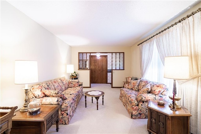 living room with light colored carpet