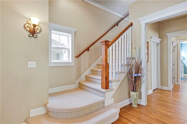 stairway featuring hardwood / wood-style flooring