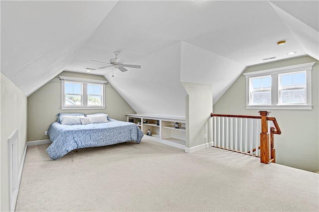 carpeted bedroom featuring ceiling fan and lofted ceiling