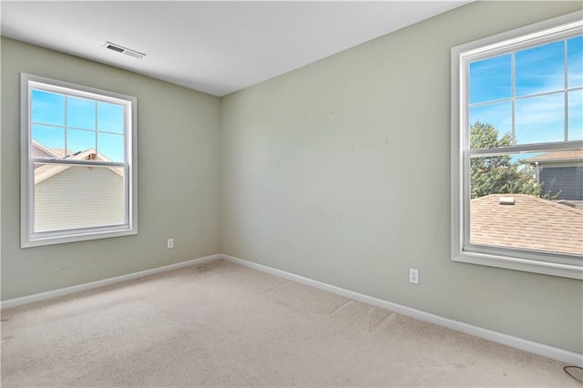 view of carpeted spare room