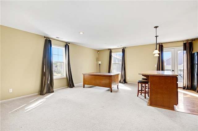 playroom featuring french doors and light colored carpet