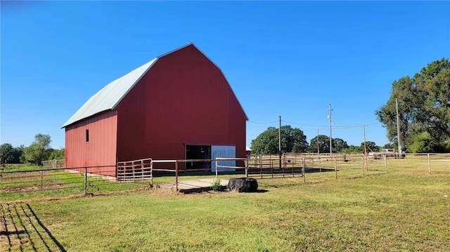 view of outbuilding featuring a rural view