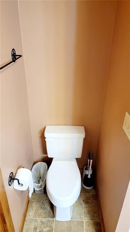 bathroom featuring toilet