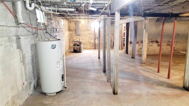 basement with water heater and electric panel