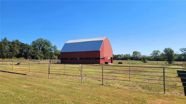 view of outdoor structure featuring a rural view