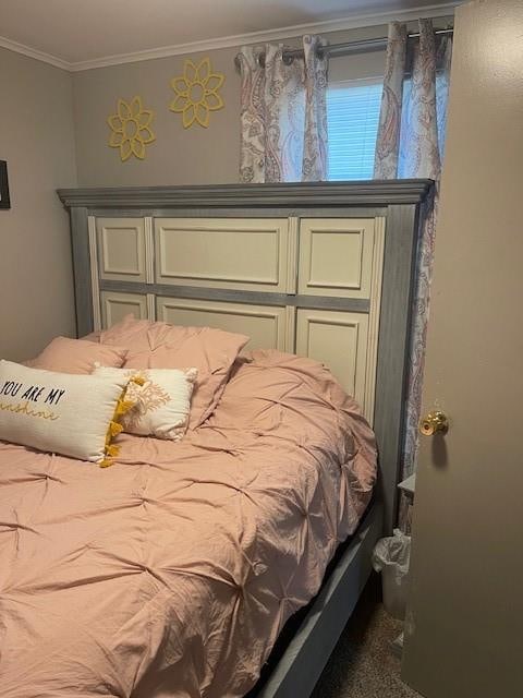 bedroom featuring ornamental molding