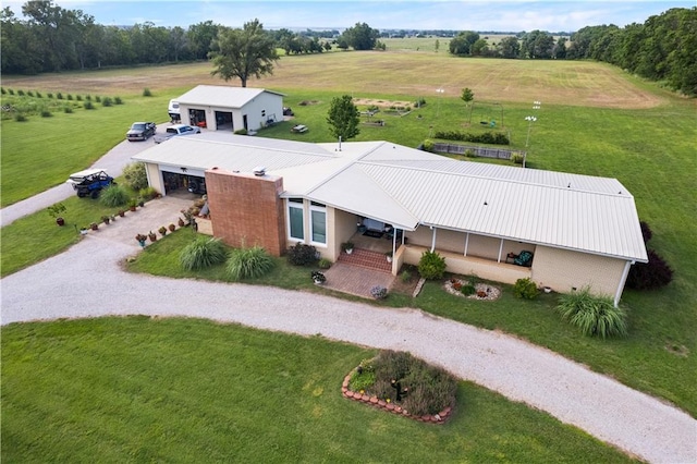 birds eye view of property featuring a rural view