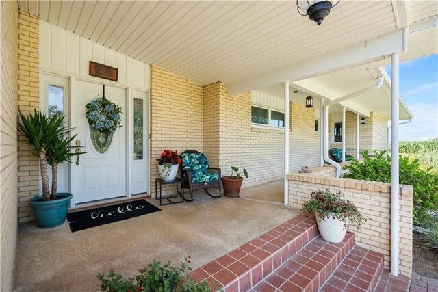 entrance to property with covered porch