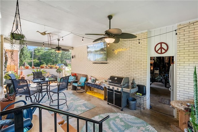 view of patio / terrace featuring grilling area and ceiling fan