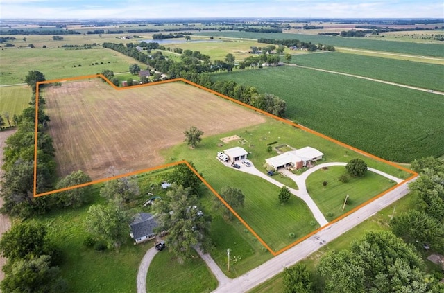 birds eye view of property featuring a rural view