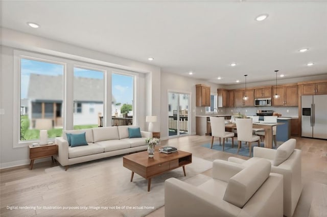 living room with recessed lighting, light wood-style flooring, and baseboards