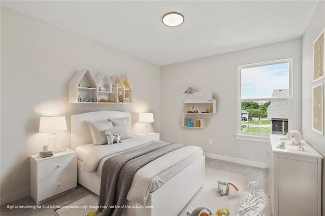 bedroom featuring carpet and baseboards