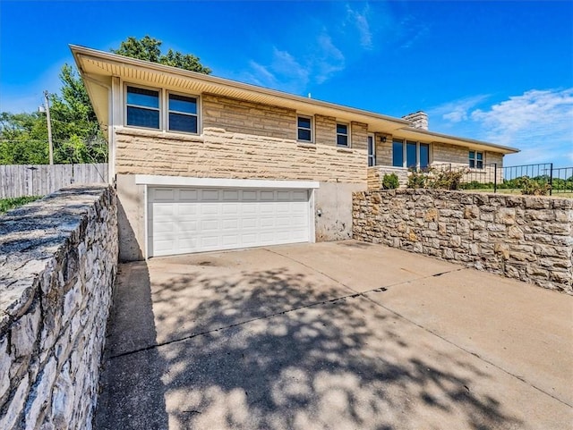 view of front of home featuring a garage