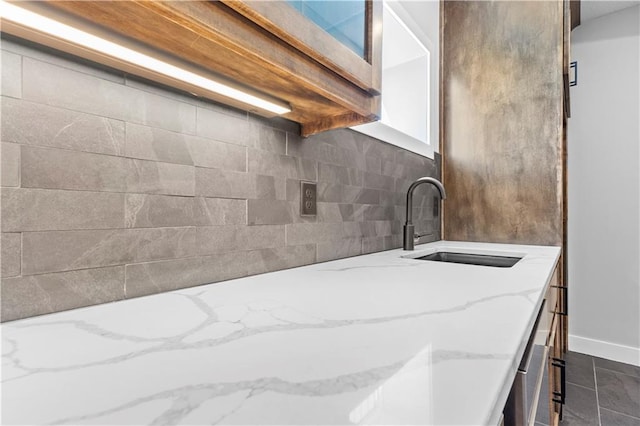 1511 SW Arbor Park Dr, Lees Summit, MO 64082 - kitchen view of tasteful backsplash and light stone countertops