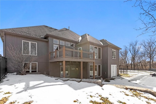 view of snow covered house