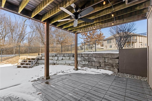 snow covered deck with ceiling fan